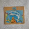 Wooden puzzle dolphin